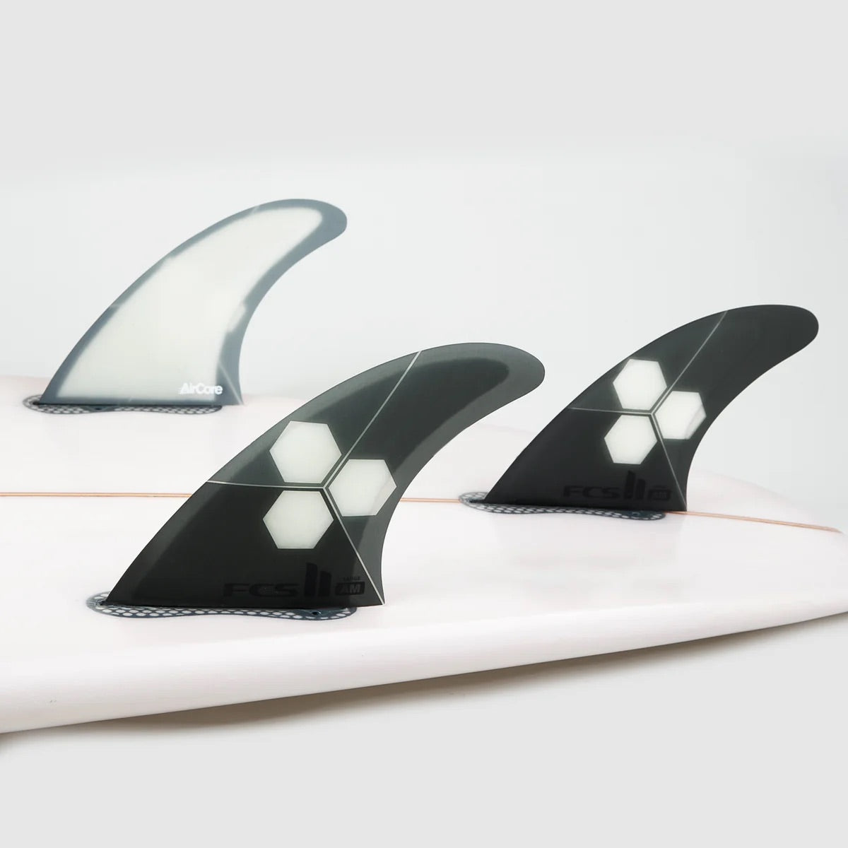 FCS II Al Merrick PC Aircore Tri Fins (Medium) - Black / Grey