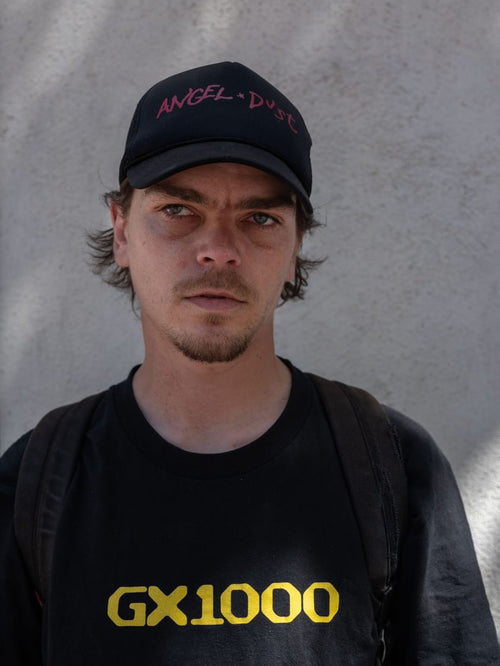 Dillon Krull wearing an "Angel Dust" Hat and GX1000 T-Shirt