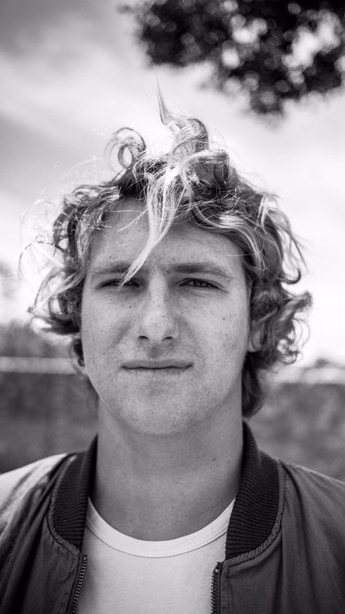 A black and white photo of Andrew Jacobson